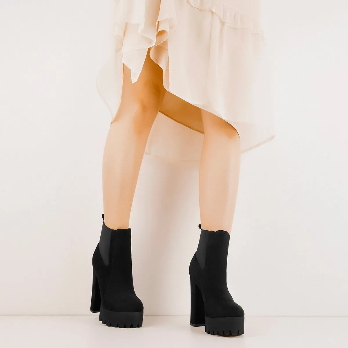 Chunky high heel black suede ankle boots