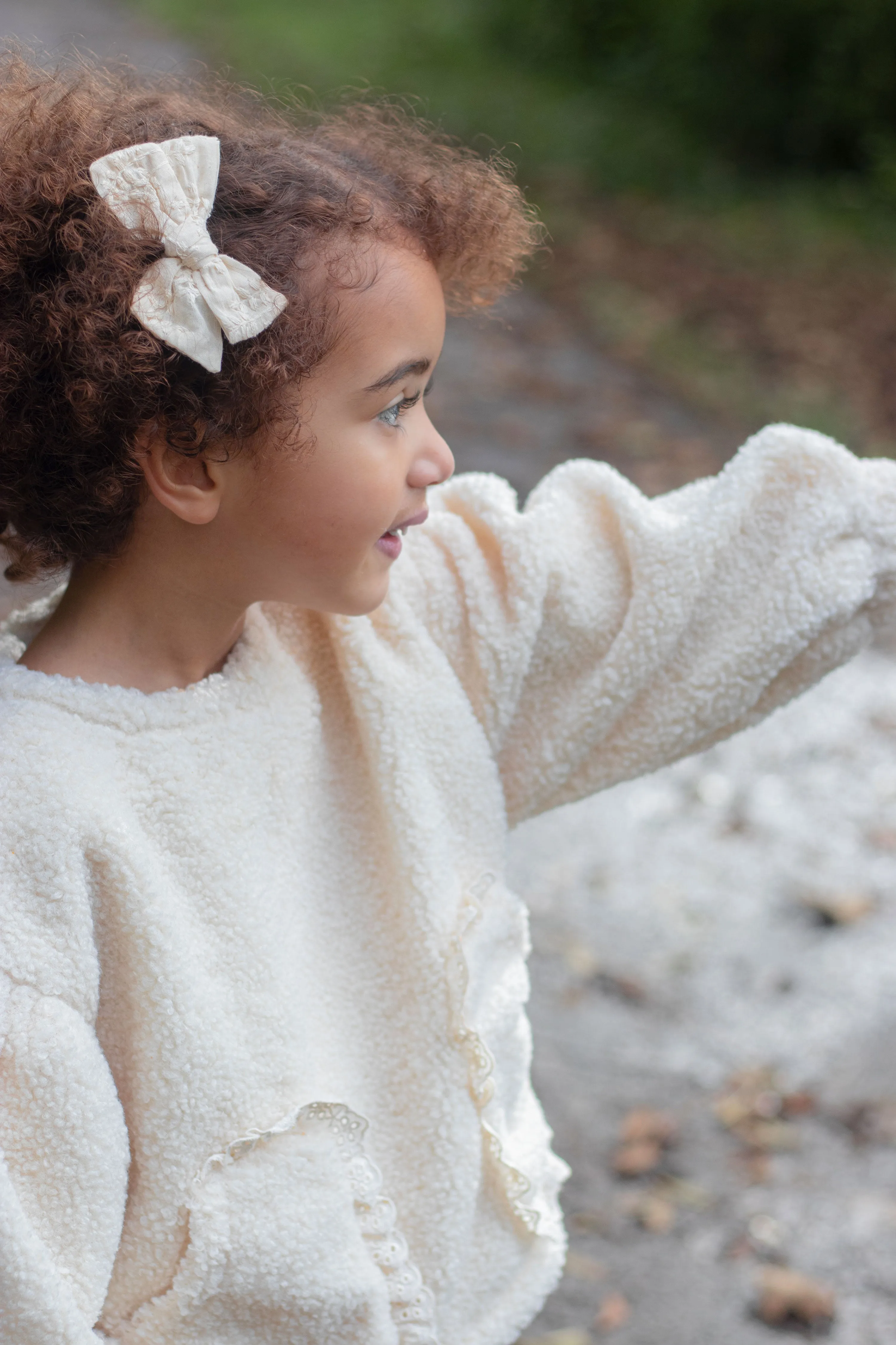 Fleece embroidered pocket sweater.