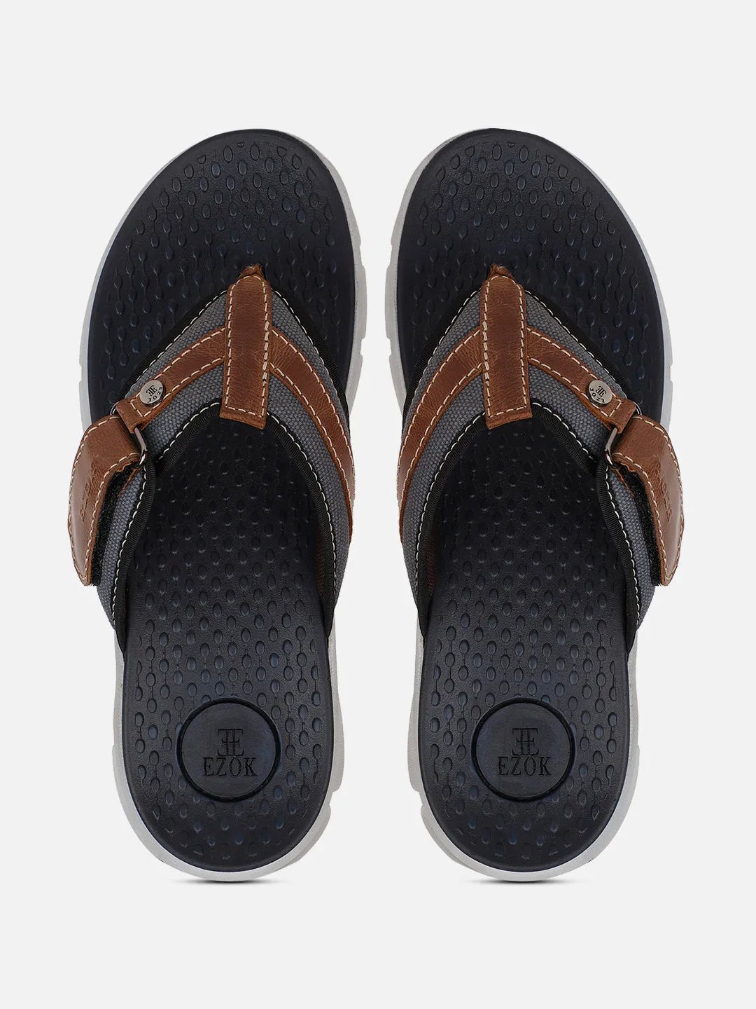 Men's brown leather flip flops.