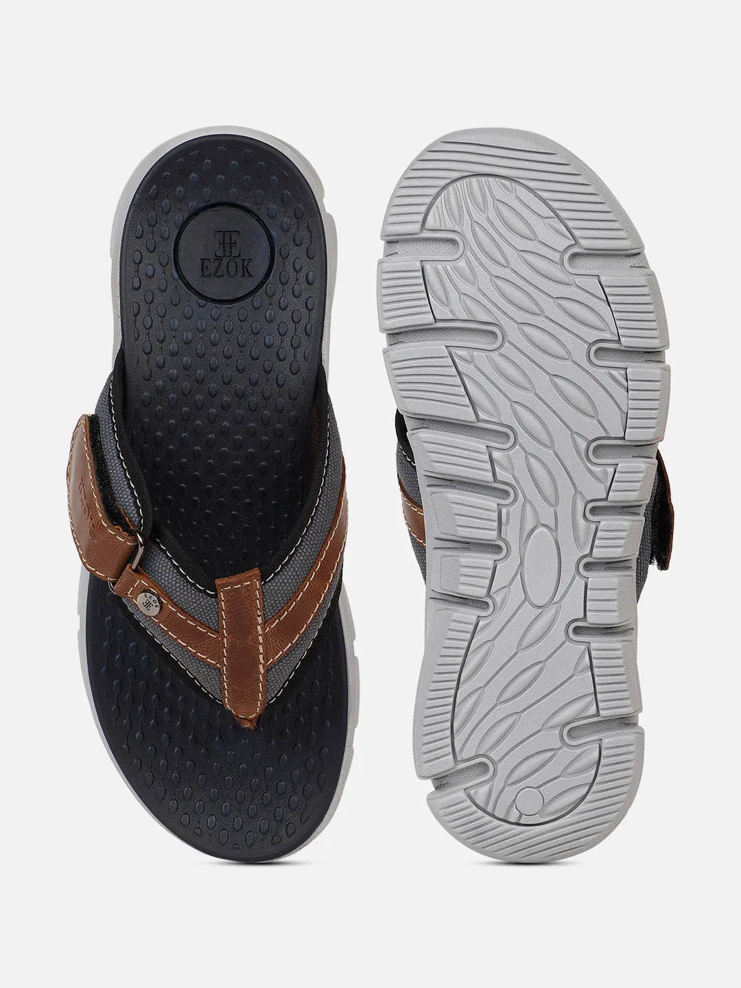 Men's brown leather flip flops.