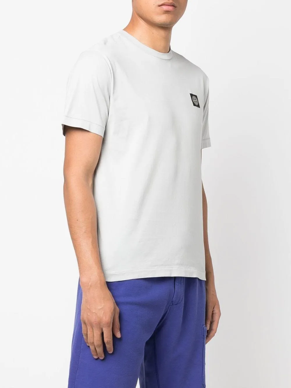 Stone Island white cotton compass motif t-shirt.